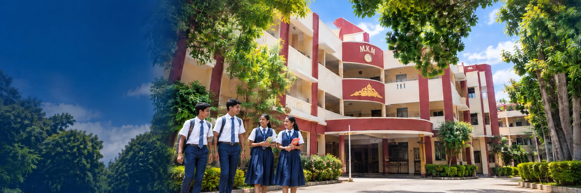 Students walking in front of the MKM Higher Secondary School campus